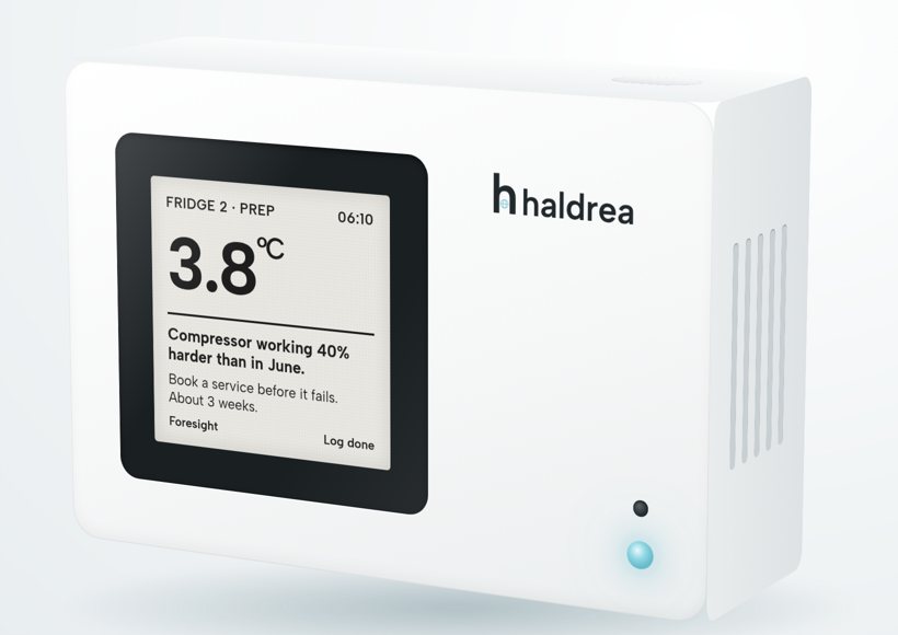 The screen reads: Fridge 2, 3.8 °C, compressor working 40% harder than in June, book a service before it fails